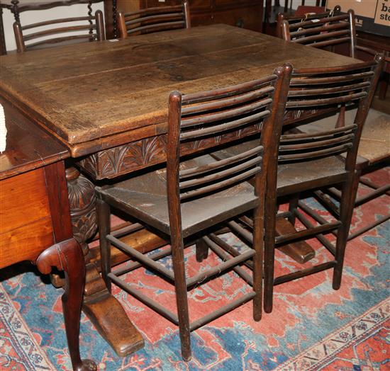 A 17th century style oak draw leaf dining table